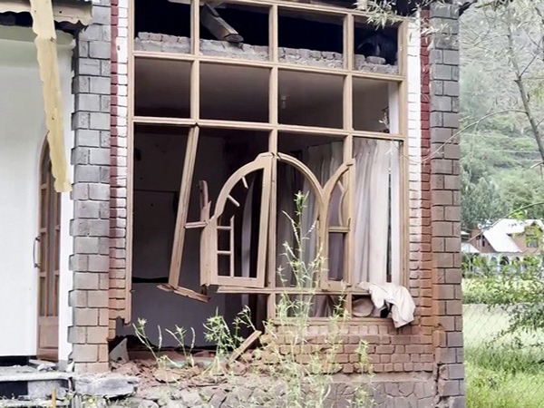 A view of a broken window in shelling by Pakistan, in Baramulla (Image/ANI)