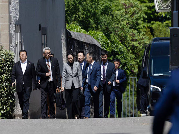 Members of the Chinese delegation leave a residence where trade talks between Chinese and US delegations take place in Geneva (Image/Reuters)