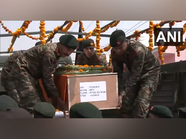 Villagers gather in Trewa to receive mortal remains of Rifleman Sunil Kumar (Photo/ANI)