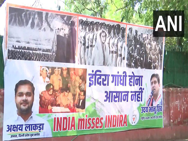 Posters with slogans 'Indira hona aasan nahi' and 'India misses Indira' outside Congress headquarters (Photo/ANI)