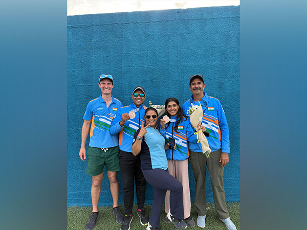 Kynan Chenai (with medal) and Sabeera Haris (with medal) after winning  bronze medal in Trap Mixed Team event at Shotgun World Cup in Nicosia (Image: NRAI)
