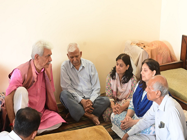 Manoj Sinha visited the family of ADDC Raj Kumar Thapa (Photo/ANI)