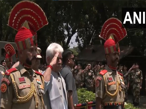 J-K Lt Governor Manoj Sinha pays last respects to BSF constable Deepak Chingakham (Photo: ANI)