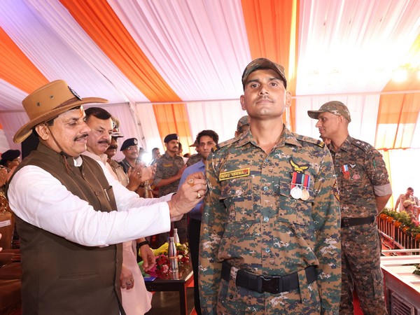 MP CM Mohan Yadav pinning the badge of promotion (Photo/DPR)