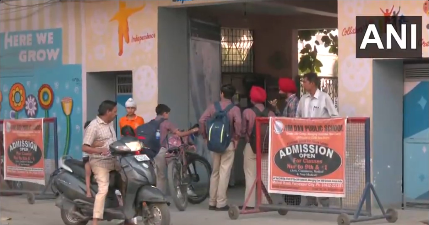 Parents dropping off children to school in Firozpur (Photo/ANI)