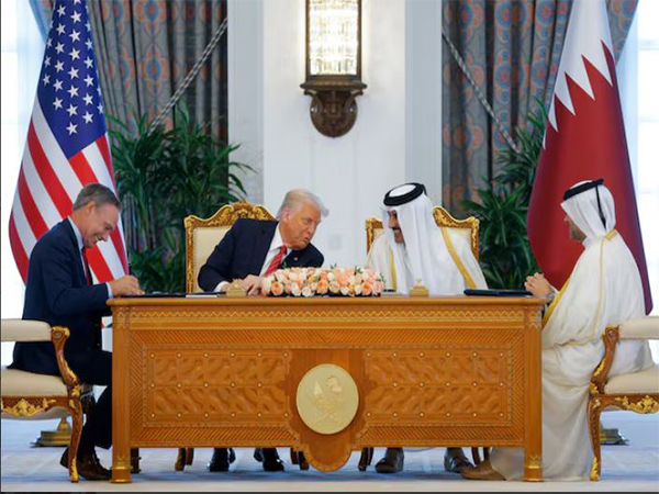 President Donald Trump and Qatar's Emir Sheikh Tamim bin Hamad Al-Thani at a signing ceremony in Doha (Photo/Reuters)