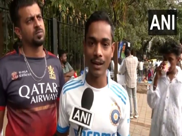 Cricket fan outside M. Chinnaswamy Stadium (Photo: ANI)