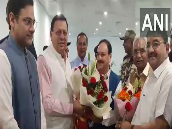 Uttarakhand CM Dhami welcomes Union Minister JP Nadda at Jolly Grant airport (Photo/ANI) 