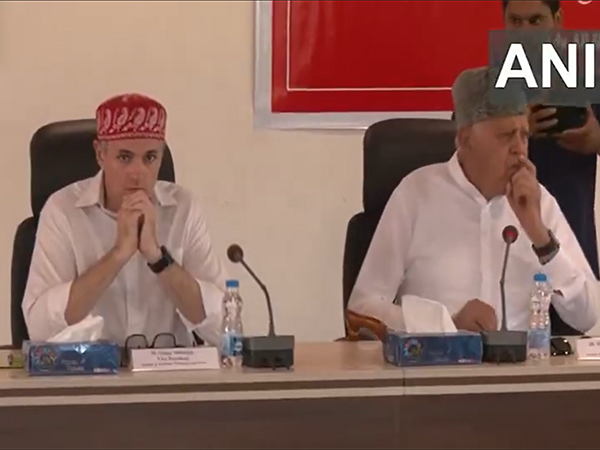 National Conference Party President Farooq Abdullah (L); J-K CM Omar Abdullah (Photo/ANI)