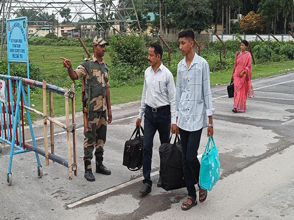 Bangladeshi nationals urge for peace and political transformation (Photo/ANI) Bangladeshi nationals urge for peace and political transformation (Photo/ANI)