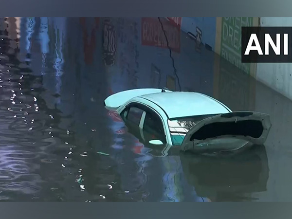 Visuals from Delhi Cantt showing car submerged in water (Photo/ANI) Visuals from Delhi Cantt showing car submerged in water (Photo/ANI)