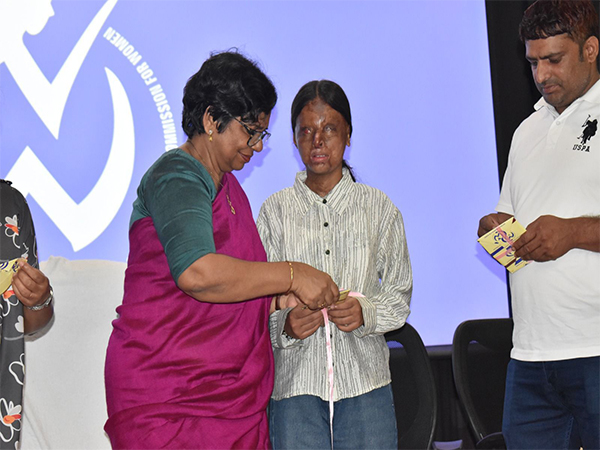 Chairperson of the NCW Vijaya K Rahatkar with acid attack survivor “Kaafi”. (Photo/ANI)