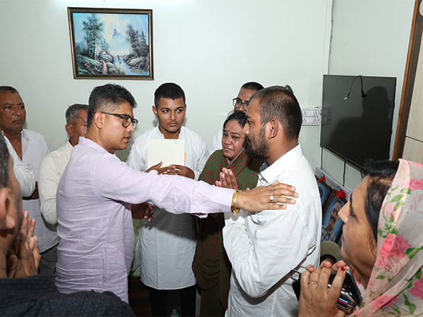 Assam Minister Pijush Hazarika visits house of bereaved family member in Gujarat. (Photo/ANI)