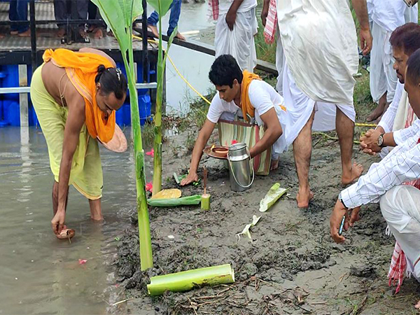  Devotees of the revered Dakhinpat Satra in Majuli gathered at Afala Ghat (Photo/ANI) 
