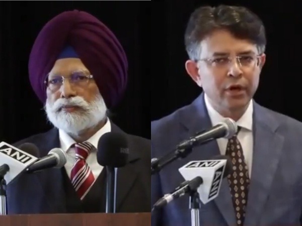Ambassador Manish Prabhat (R) and MP Amar Singh (L) address Indian diaspora in Denmark (Photo/ANI)