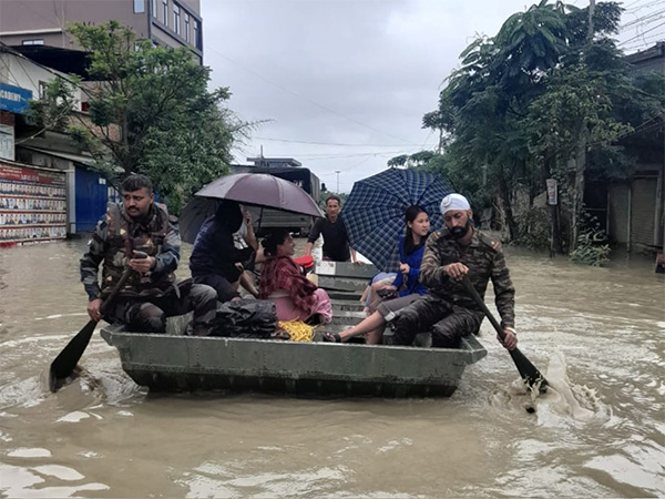 Security personnel rescue people stranded in floods in Northeastern states (Photo/X@adgpi)
