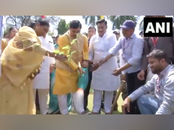 MP CM Mohan Yadav is planting sapling  “Ek Ped Maa Ke Naam” campaign on Environment Day in Bhopal (Photo/ANI)