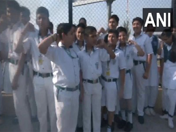 Students expectantly wait for PM Modi's visit to Katra railway station (Photo/ANI)