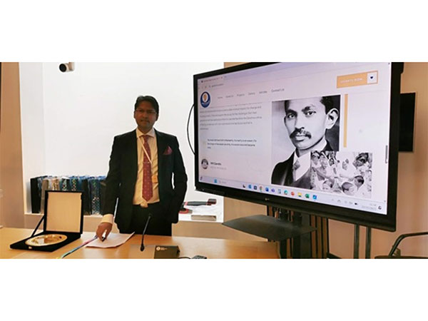 Dhruva Kumar, General Secretary of the Gandhian Peace Society, delivers a keynote address at the Scottish Parliament