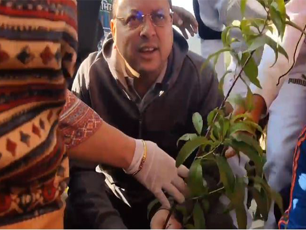 Uttarakhand CM Pushkar Singh Dhami plants a tree in Pant Park(Photo/ANI)