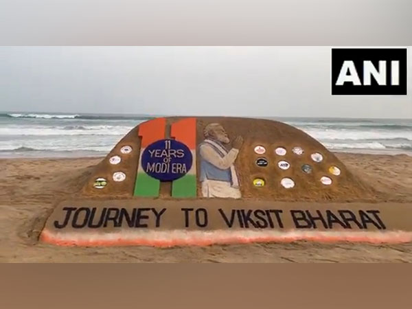 Sudarshan Pattnaik creates sand art marking 11 years of Modi government (Photo/ANI)