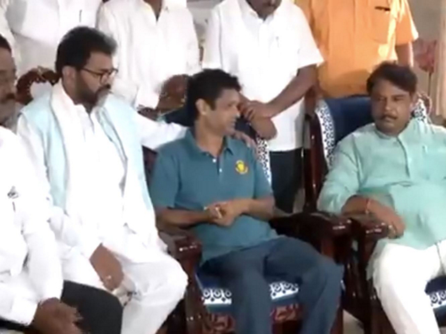 Karnataka LoP R Ashoka with the family of Bhumik (Photo/ANI)