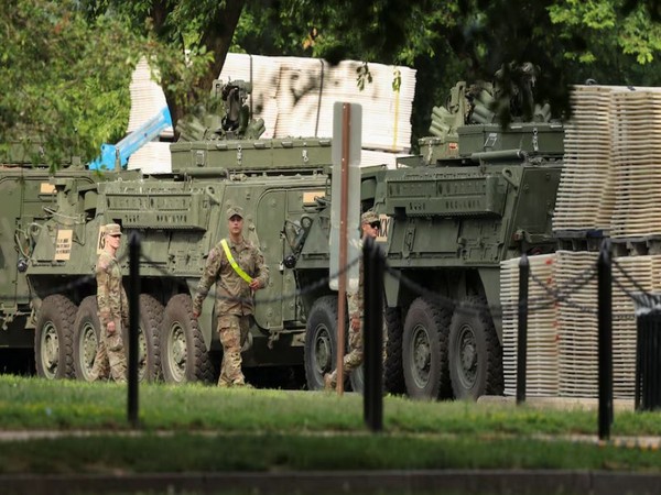 Soldiers walk past Stryker combat vehicles parked in West Potomac Park ahead of the upcoming US Army 250th anniversary celebration parade in Washington DC (Representational Image/Reuters)