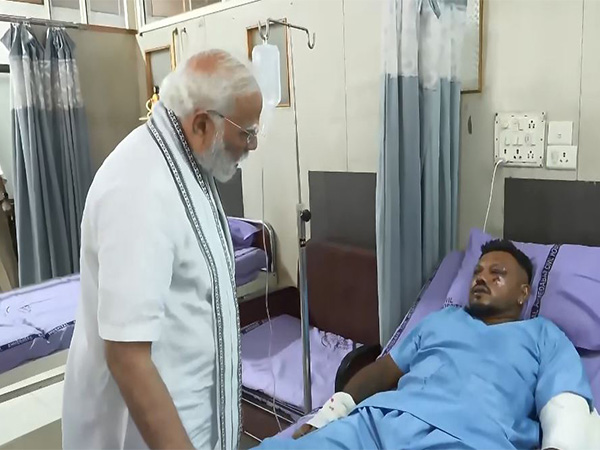 PM Modi meets lone survivor of AI-171 flight crash (Photo/ANI)