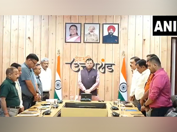 Uttarakhand CM Pushkar Singh Dhami observes two minutes silence for victims of AI-171 plane crash (Photo/ANI) 