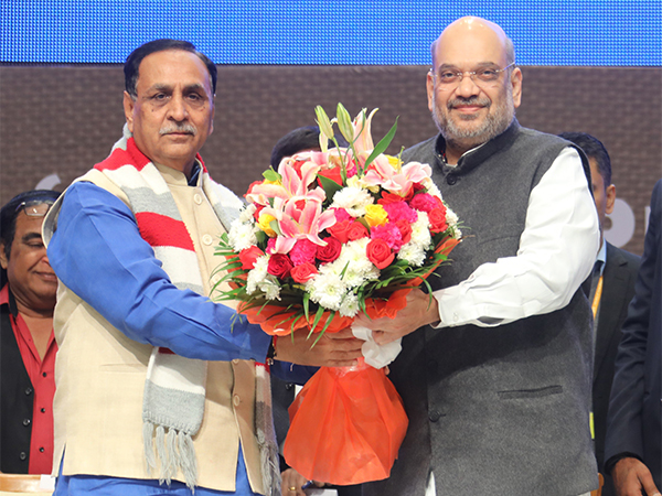 Union Home Minister Amit Shah with former Gujarat Chief Minister Vijay Rupani. (Photo/ANI)