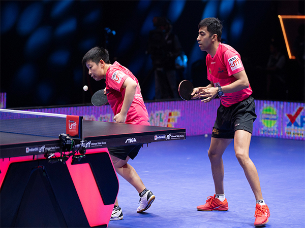 Zeng Jian and Harmeet Desai of Dempo Goa Challengers TT in action (Photo: UTT)