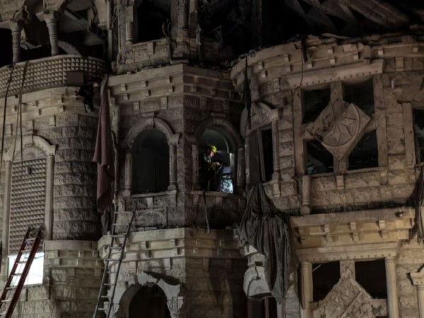 A rescue worker sits inside a residential building following the impact of missiles fired from Iran, in Tamra, Israel (Image/Reuters)