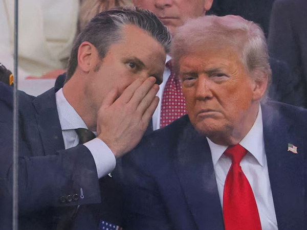 US Secretary of Defence Pete Hegseth talks to US President Donald Trump during the US Army's 250th Birthday parade (Image/Reuters)