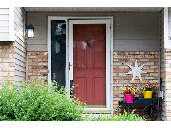 Bullet holes mark front door of Minnesota state Senator John Hoffman, who was shot alongside his wife. (file Photo/Reuters)