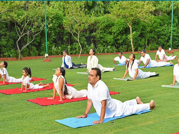 Rajasthan Chief Minister Bhajanlal Sharma performs yoga at his residence (Photo: @BhajanlalBjp/X)