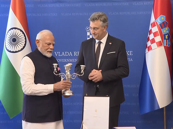 Prime Minister Narendra Modi exchanges gifts with Croatia PM Andrej Plenković and signed a book at Banski Dvori (Image/ANI)