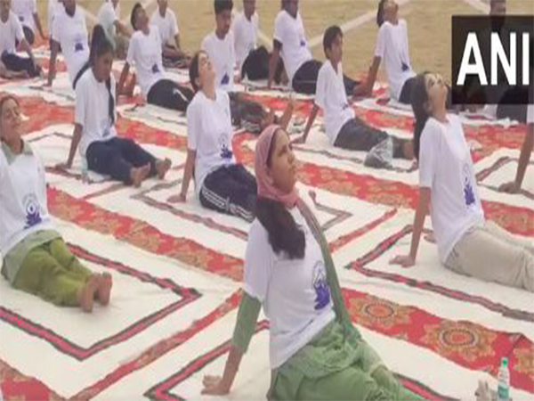 Indian Army organises yoga session for locals in Akhnoor ahead of Int’l Yoga Day (Photo/ANI) 