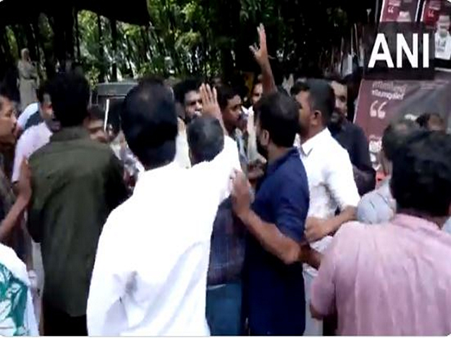UDF and LDF workers enter into a scuffle with each other in Kurumbalangod of Malappuram district on Thursday. (Photo/ANI)