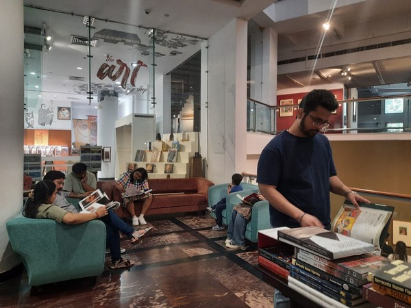 Readers enjoying books on the occasion of National Reading Day at the National Gallery of Modern Art in Delhi (Photo/ANI)