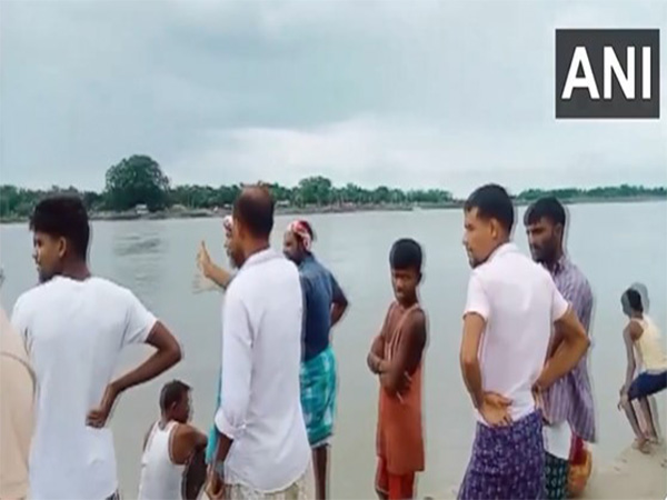 Few people are reported missing after a country-made passenger boat capsized in the Brahmaputra River in Assam. (Photo/ANI)