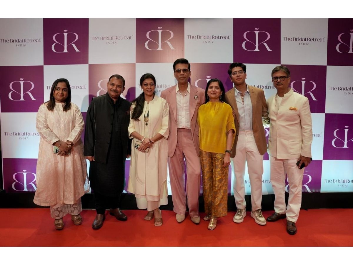 L to R : Reshma Srijay, Samit Garg (Managing Director of E-Factor Experiences Ltd), Manika Garg (Vice President), Karan Johar, Sonali Thakore (Vice President), Aryamaan Thakore and Jai Thakore (Chairman)