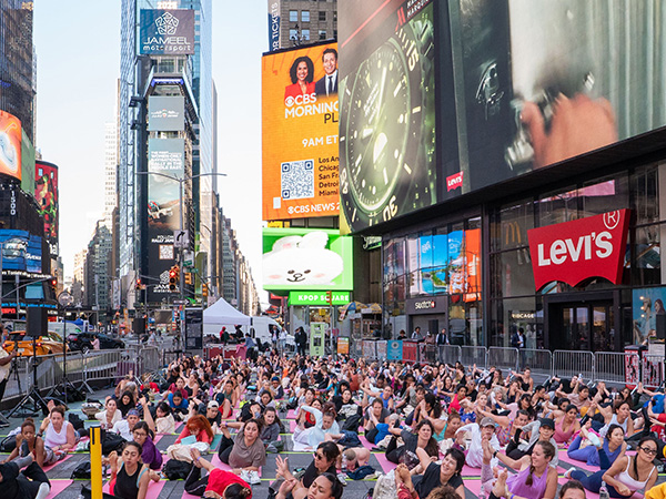 Yoga enthusiasts gather at Times Square for International Yoga Day celebrations (Image: X @IndiainNewYork)