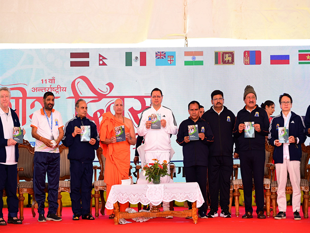 Uttarakhand CM Dhami formally launches book on Yoga Policy on occasion of International Yoga Day (Photo/ANI) 