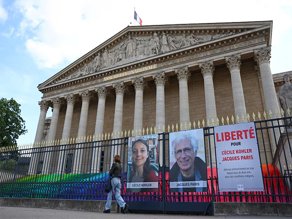 Posters of French nationals Cécile Kohler and Jacques Paris in France. (File Photo/Reuters)