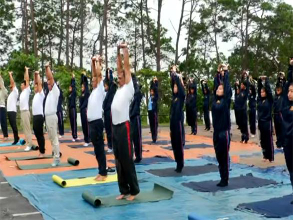 NCC cadets and officials participate in Yoga Day session. (Photo/ANI)