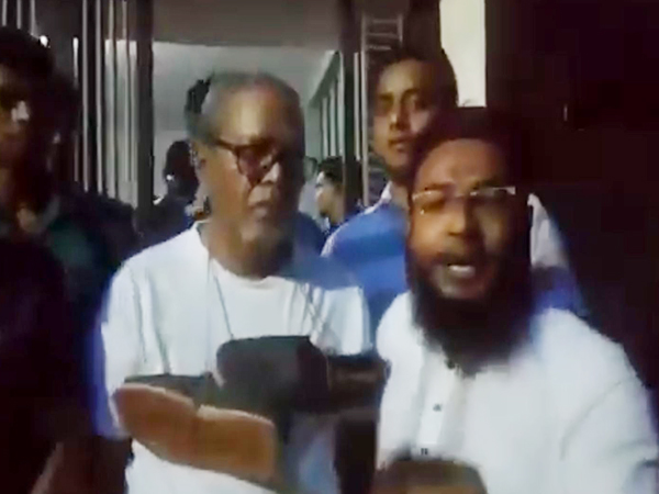 Bangladesh’s former CEC Nurul Huda was attacked by a mob in Dhaka (Image Credit: X/@ALBrahmanbaria)