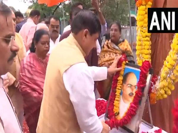 MP CM Mohan Yadav paying floral tribute to Dr Syama Prasad Mookerjee (Photo/ANI) 