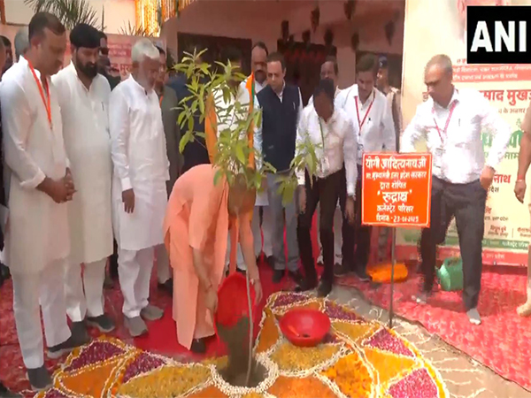 UP CM Yogi Adityanath plants sapling on Syama Prasad Mookerjee's death anniversary (Photo/ANI)