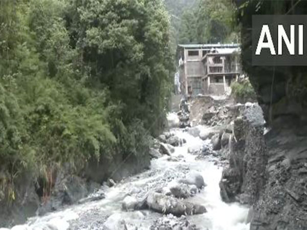Damaged roads and swept-away vehicles after flash floods in Dharamshala (Photo/ANI)