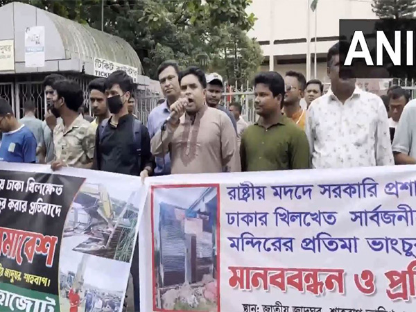 Minority groups formed human chain in Shahbagh to hold protest against Durga Temple demolition (Photo/ANI)